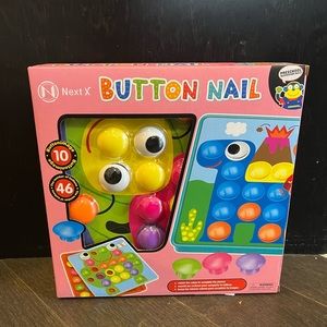 NextX Button Nail Toy (Brand New)